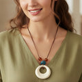 White Stone pendant necklace with leather chain
