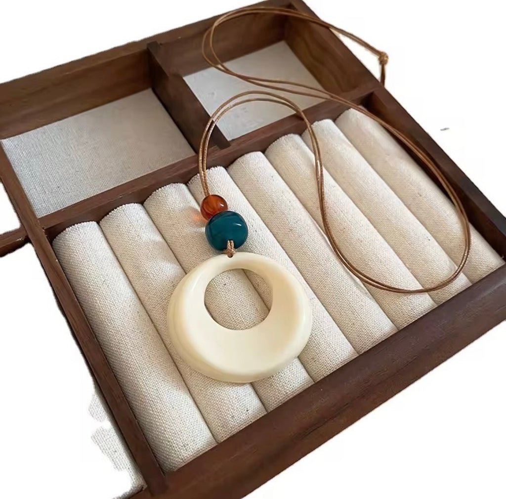White Stone pendant necklace with leather chain