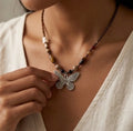 Butterfly pendant with metal chain necklace
