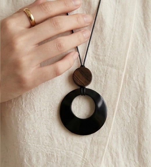 Black and brown stone pendant with leather chain necklace