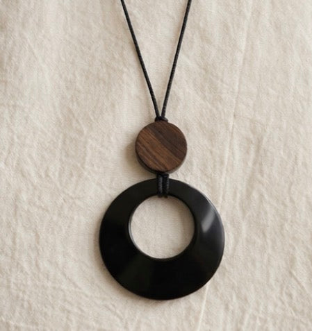 Black and brown stone pendant with leather chain necklace